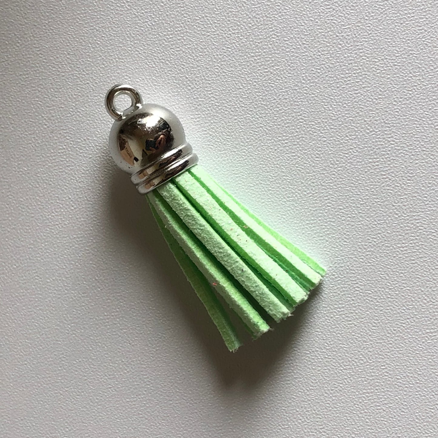 Licht groene tassel voor aan sleutelhanger