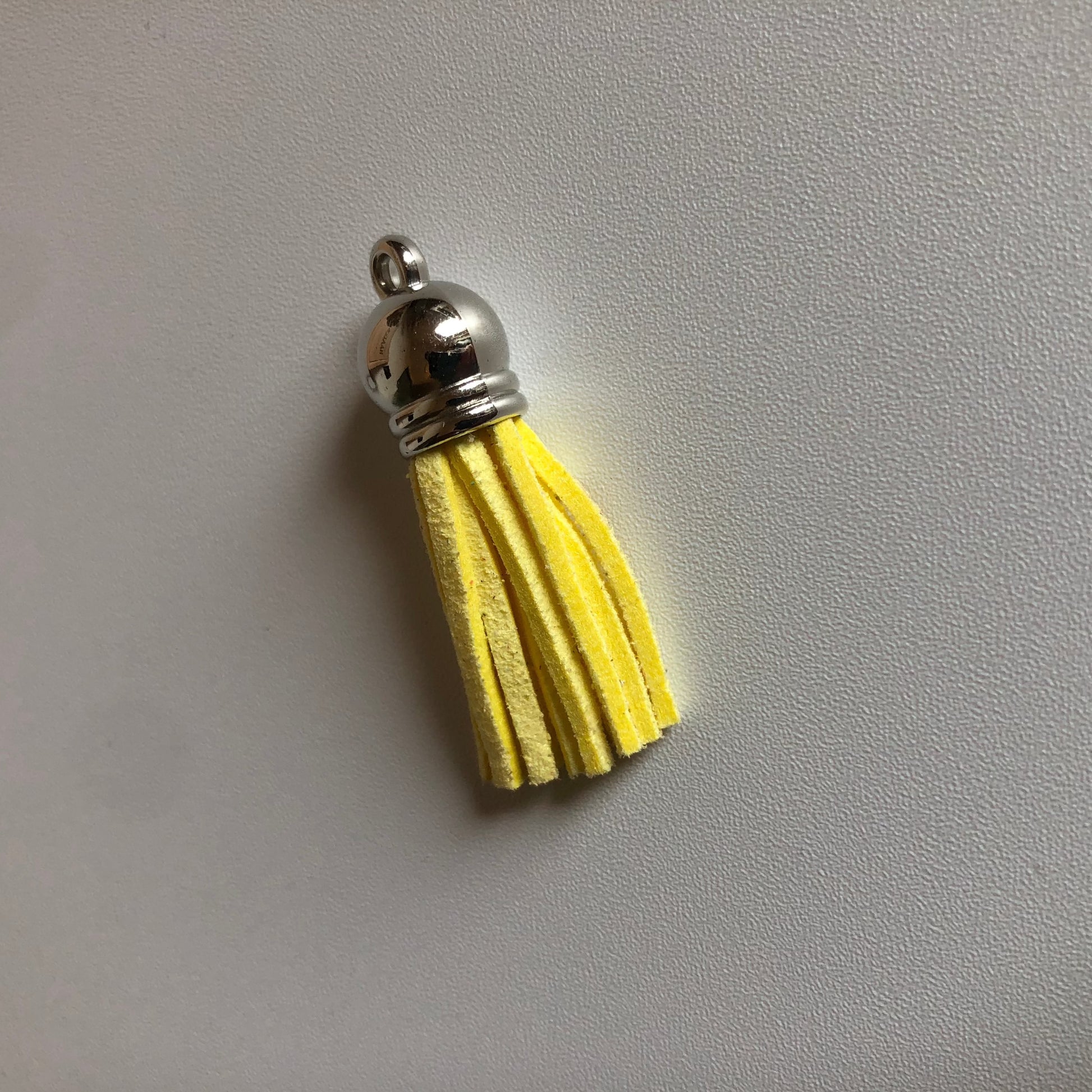 Gele tassel voor aan sleutelhanger