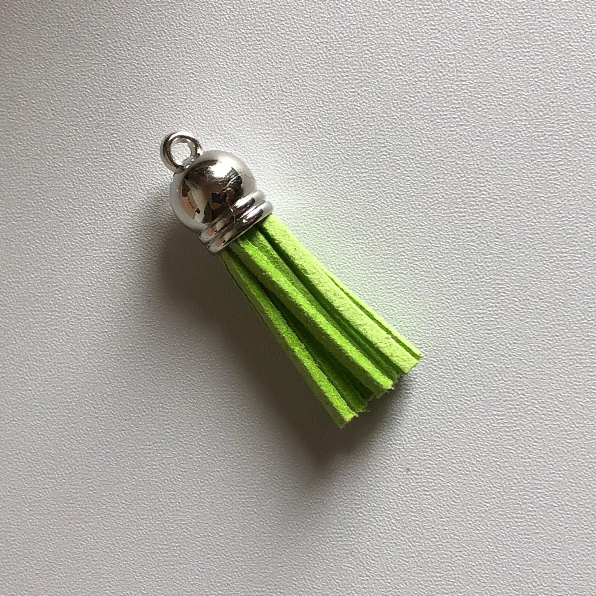 Grasgroene tassel voor aan sleutelhanger