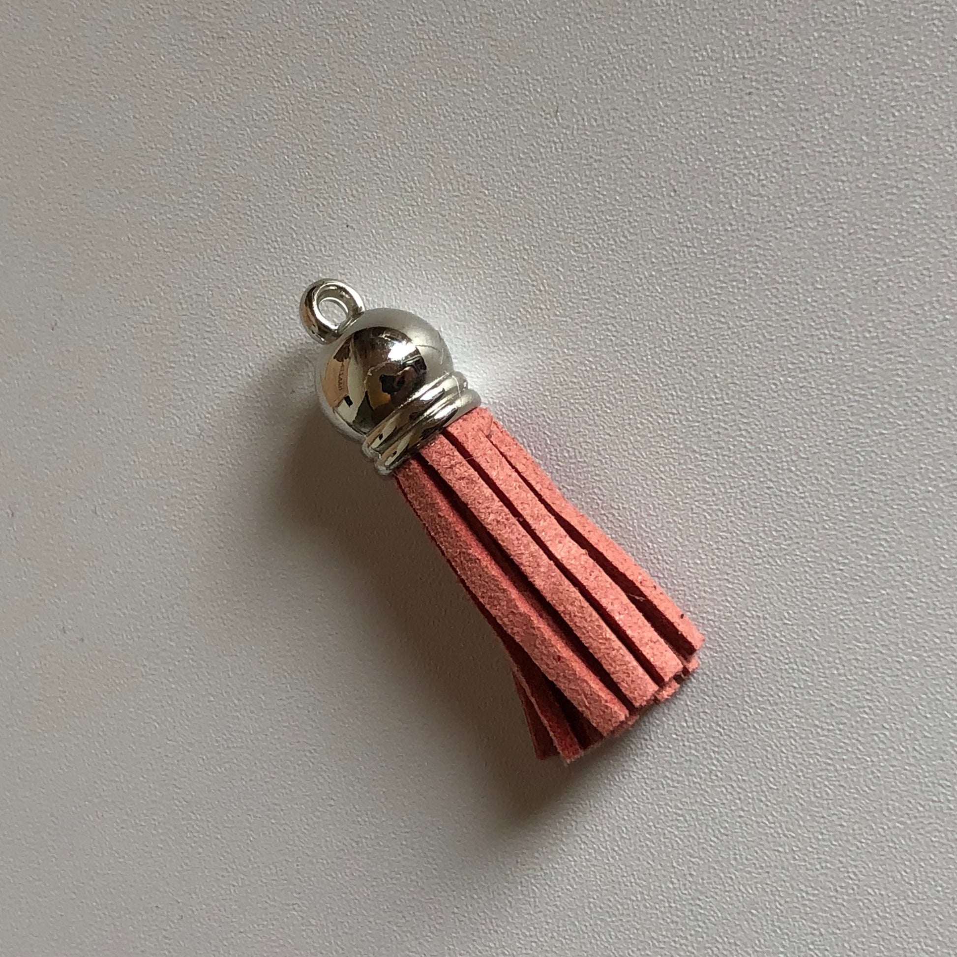 Oud roze tassel voor aan sleutelhanger